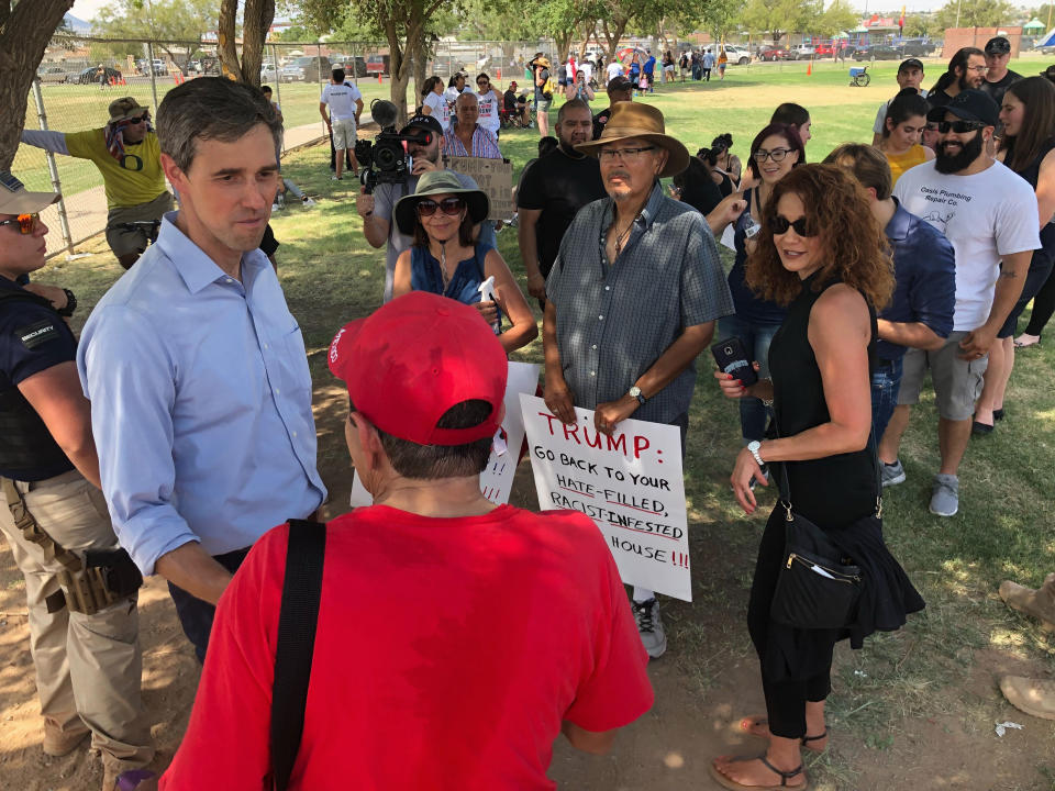 Democratic presidential candidate Beto O'Rourke, meets with residents of El Paso, Texas, after a community "unity" rally a few blocks from the University Medical Center of El Paso where victims of Saturday's shooting are being treated Wednesday, Aug. 7, 2019. Speaking to several hundred people, O'Rourke said immigrants had made El Paso one of the safest cities in America, before Saturday's shooting. (AP Photo/Morgan Lee)