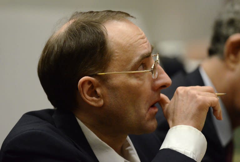 Defendant Christian Gerhartsreiter listens to the prosecutor during his murder trial at Los Angeles Superior Court on March 18, 2013 in Los Angeles, California. The German who posed as a Rockefeller family member after allegedly killing a man in California explained the freshly-dug soil in his back yard as plumbing work, a witness said