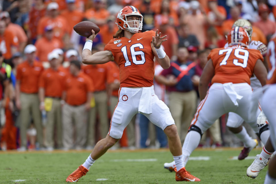 Clemson quarterback Trevor Lawrence drops back to pass during the first half of an NCAA college football game against Florida State Saturday, Oct. 12, 2019, in Clemson, S.C. (AP Photo/Richard Shiro)