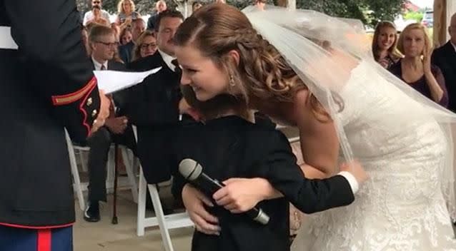 Senior Airman Emily Leehan hugs Gage Newville, just before she becomes Emily Newville. Photo: Supplied