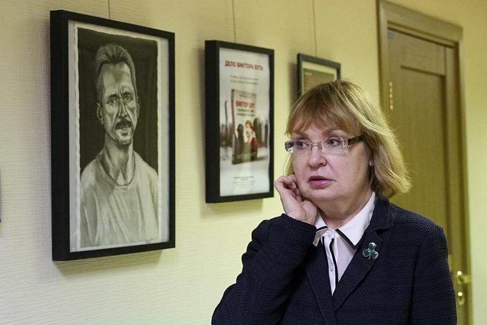 Viktor Bout's wife, Alla, speaks on the phone prior to an opening of exhibition of artworks by her husband, Russian businessman Viktor Bout, who was sentenced to 25 years in the United States, at the Federation Council of the Federal Assembly of the Russian Federation in Moscow, Russia, Tuesday, Nov. 15, 2022. Russia has sought Bout's release for years and he is believed to be key to a possible prisoner exchange that could free US women's basketball star Brittney Griner. (AP Photo/Alexander Zemlianichenko)