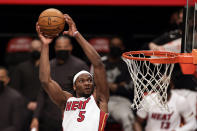 Miami Heat forward Precious Achiuwa dunks during the first half of an NBA basketball game against the Brooklyn Nets, Monday, Jan. 25, 2021, in New York. (AP Photo/Adam Hunger)