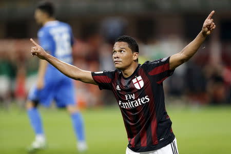 AC Milan's Carlos Bacca celebrates after scoring against Empoli during their Serie A soccer match at San Siro stadium in Milan, August 29, 2015. REUTERS/Giampiero Sposito