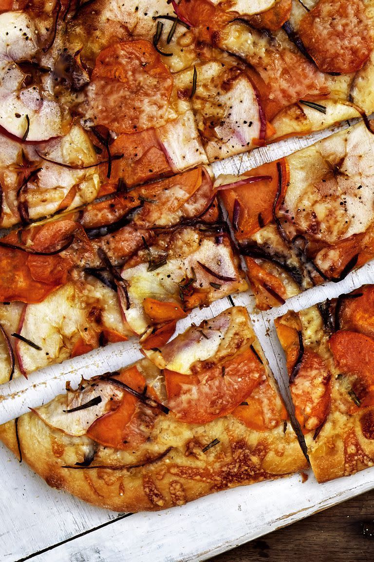 <p>Why not serve pizza at Thanksgiving? Nutty Gruyère cheese serves as the perfect complement to other fall flavors like apple, rosemary, and (of course) roasted sweet potato.</p><p><a href="https://www.womansday.com/food-recipes/food-drinks/a23602057/apple-sweet-potato-and-rosemary-flatbread-recipe/" rel="nofollow noopener" target="_blank" data-ylk="slk:Get the recipe for Apple, Sweet Potato, and Rosemary Flatbread.;elm:context_link;itc:0;sec:content-canvas" class="link "><em>Get the recipe for Apple, Sweet Potato, and Rosemary Flatbread. </em></a></p>