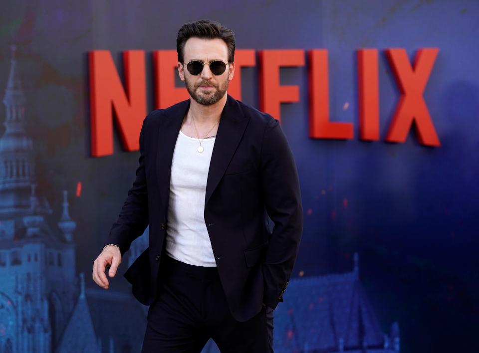 Up next on Chris Evans' plate is an onscreen reunion with "Knives Out" co-star Ana de Armas for the Apple TV+ film "Ghosted," slated for next year. In this photo, Evans, a cast member in "The Gray Man," arrives at the premiere of the Netflix film, Wednesday, July 13, 2022, at the TCL Chinese Theatre in Los Angeles.