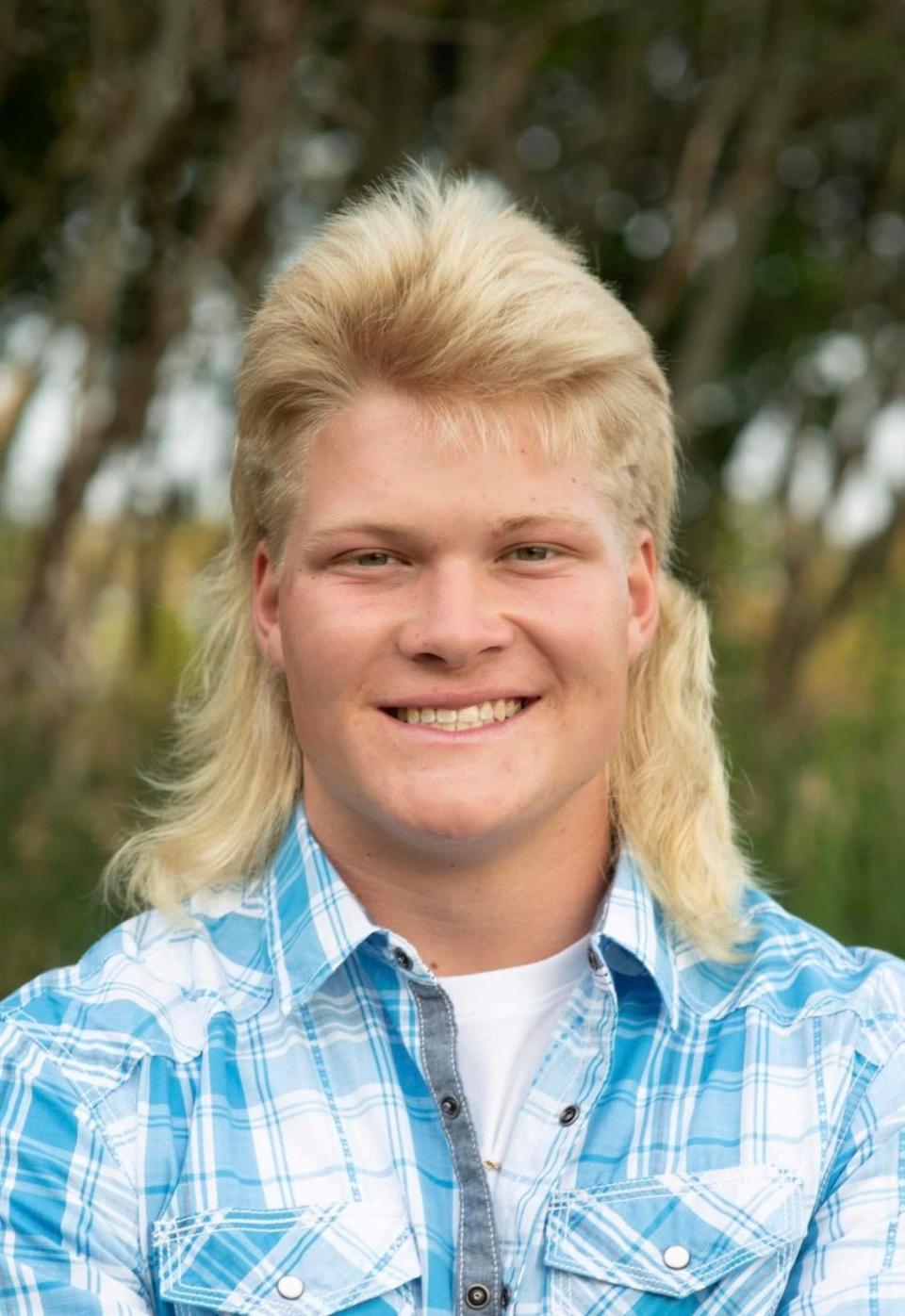 Cayden Kershaw, 18 of Wausau, poses for his submission photos for the 2022 USA Mullet Championships.