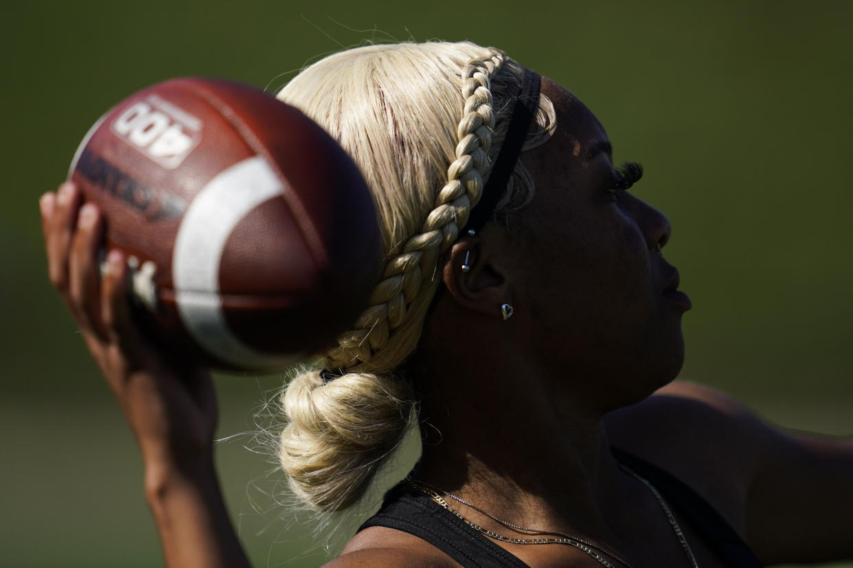 FILE - Sa'Mir Braccey, 17, throws a pass as she tries out for the Redondo Union High School girls flag football team on Thursday, Sept. 1, 2022, in Redondo Beach, Calif. California officials are expected to vote Friday on the proposal to make flag football a girls' high school sport for the 2023-24 school year. (AP Photo/Ashley Landis, File)