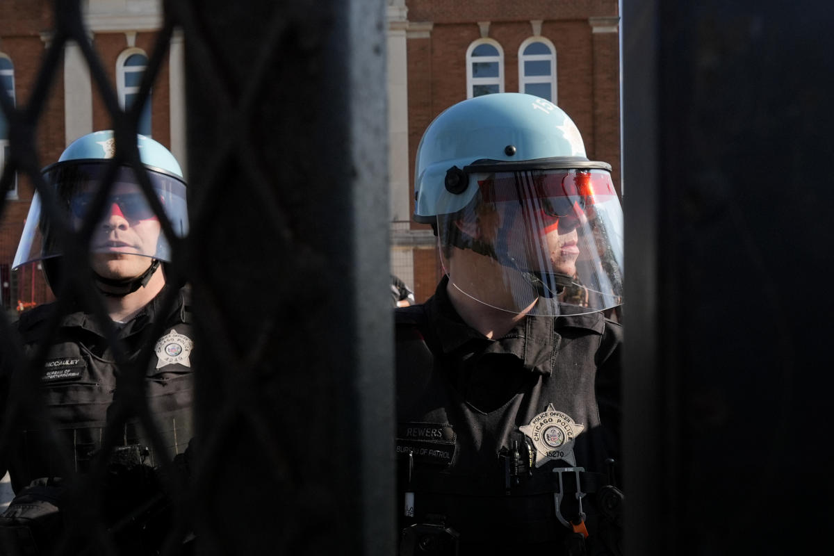 Police erect fences ahead of second planned day of protests in Chicago for the Democratic Party Convention