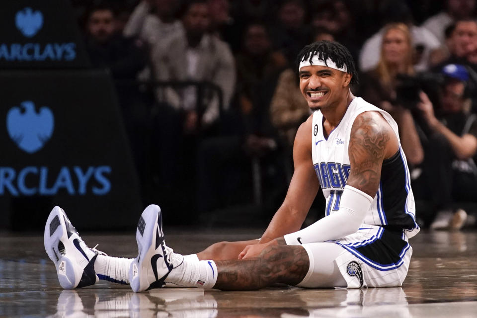 Orlando Magic guard Gary Harris smiles after falling during the first half of an NBA basketball game against the Brooklyn Nets, Monday, Nov. 28, 2022, in New York. (AP Photo/Julia Nikhinson)
