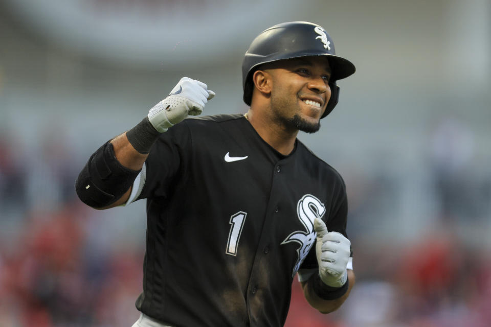 Chicago White Sox's Elvis Andrus fist-pumps as he runs the bases after hitting a three-run home run during the fifth inning of a baseball game against the Cincinnati Reds in Cincinnati, Friday, May 5, 2023. (AP Photo/Aaron Doster)