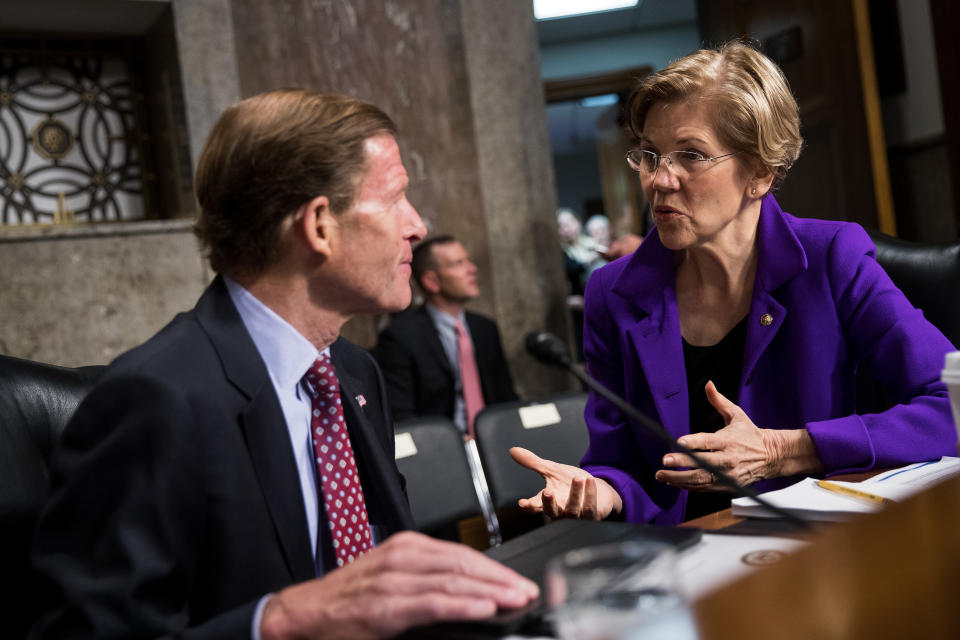 Sen. Richard Blumenthal (D-Conn.) talks with Sen. Elizabeth Warren (D-Mass.) before the start of a Senate Armed Services Committee hearing concerning the roles and responsibilities for defending the nation against cyberattacks, on Oct.&nbsp;19, 2017.