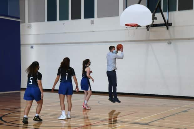 Premier Iain Rankin took to the basketball court following Saturday's announcement.