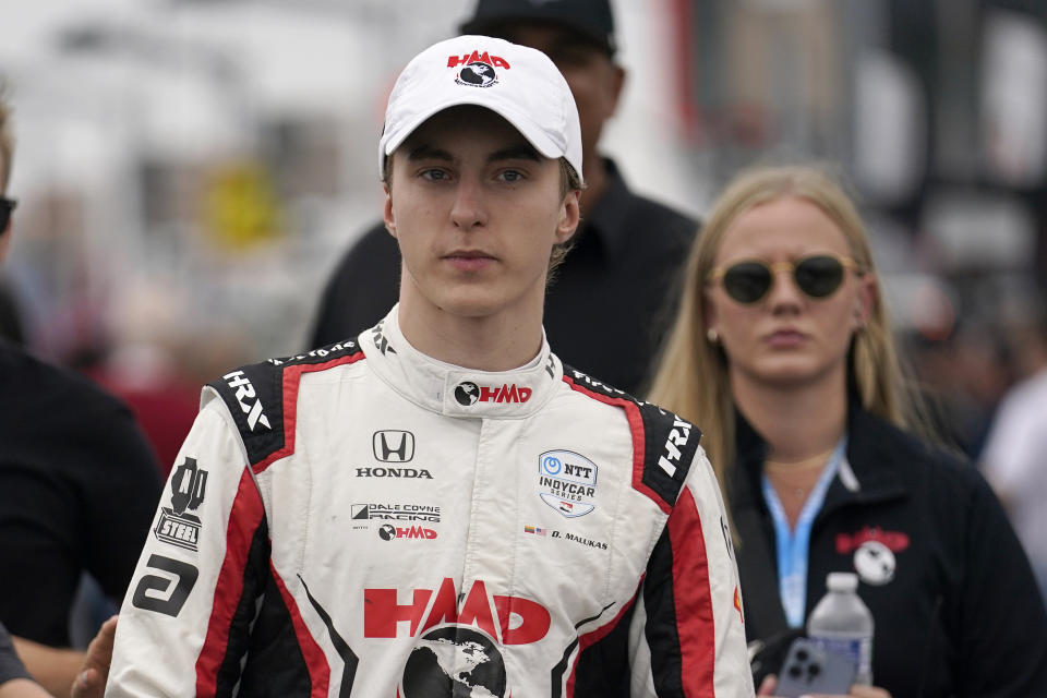 FILE - David Malukas prepares before the start of an IndyCar auto race at World Wide Technology Raceway, Sunday, Aug. 27, 2023, in Madison, Ill. David Malukas was released by Arrow McLaren on Monday, April 29, 2024, without ever running an IndyCar race for the team because of injuries the 22-year-old suffered in an offseason mountain biking crash. (AP Photo/Jeff Roberson, File)