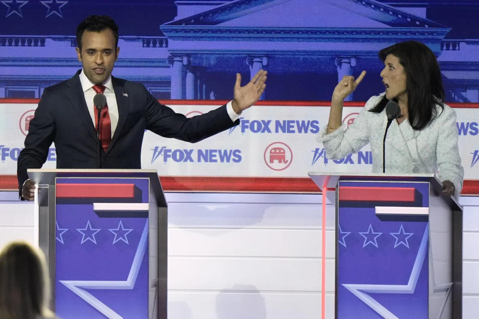 Vivek Ramaswamy and Nikki Haley engage in a spirited discussion during the first Republican presidential primary debate, in August in Milwaukee. The front-runner, Donald Trump, did not take part.