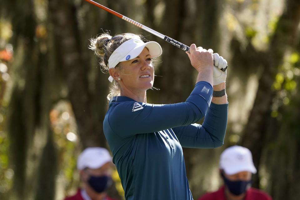 Amy Olson watches her shot off the third tee during the first round of the U.S. Women's Open golf tournament in Houston, Thursday, Dec. 10, 2020. (AP Photo/Eric Gay)
