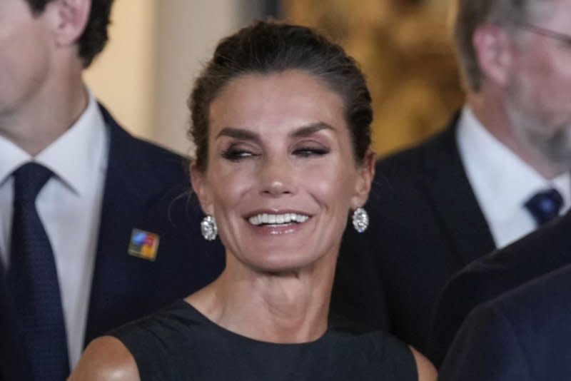 Spain's Queen Letizia participates in a family photo with other NATO country leaders and delegates before a gala dinner at the Royal Palace in Madrid, Spain, on June 28, 2022. The queen turns 51 on September 15. File Photo by Paul Hanna/UPI