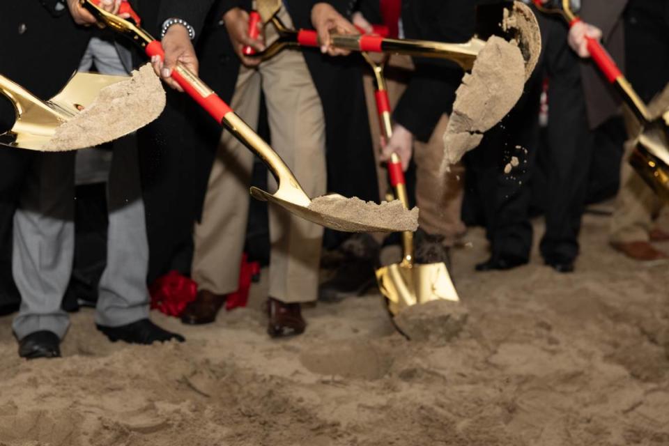 Politicians from Illinois and the metro-east scoop dirt at a groundbreaking ceremony for Venice, Ill.’s new elementary school on Feb. 16, 2024.