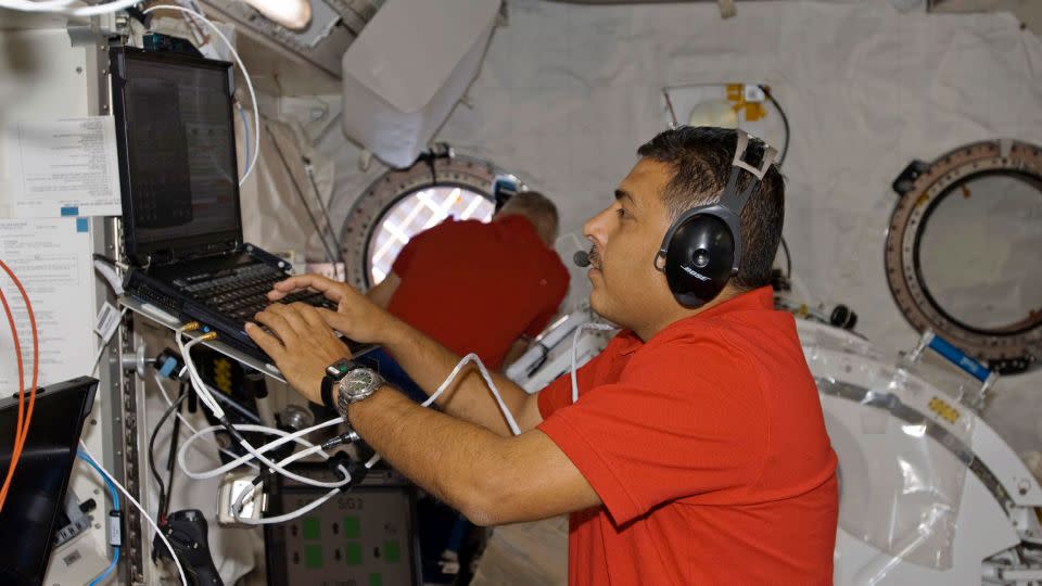 This 2009 photo from NASA shows Hernández working aboard the International Space Station. - NASA/Reuters