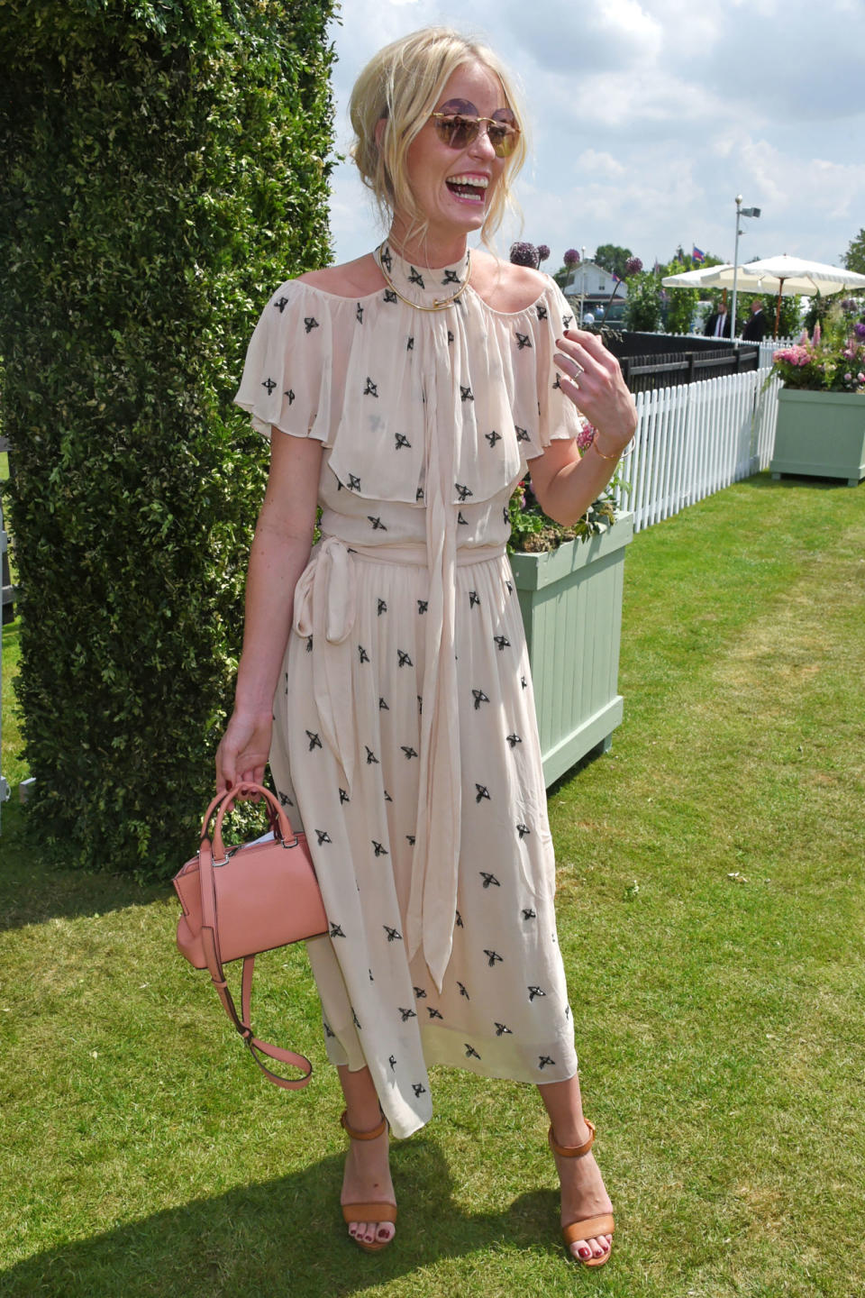 <p><strong>18 June </strong>Caroline Winberg opted for a printed chiffon dress with a Cartier bag, sunglasses and necklace. </p>