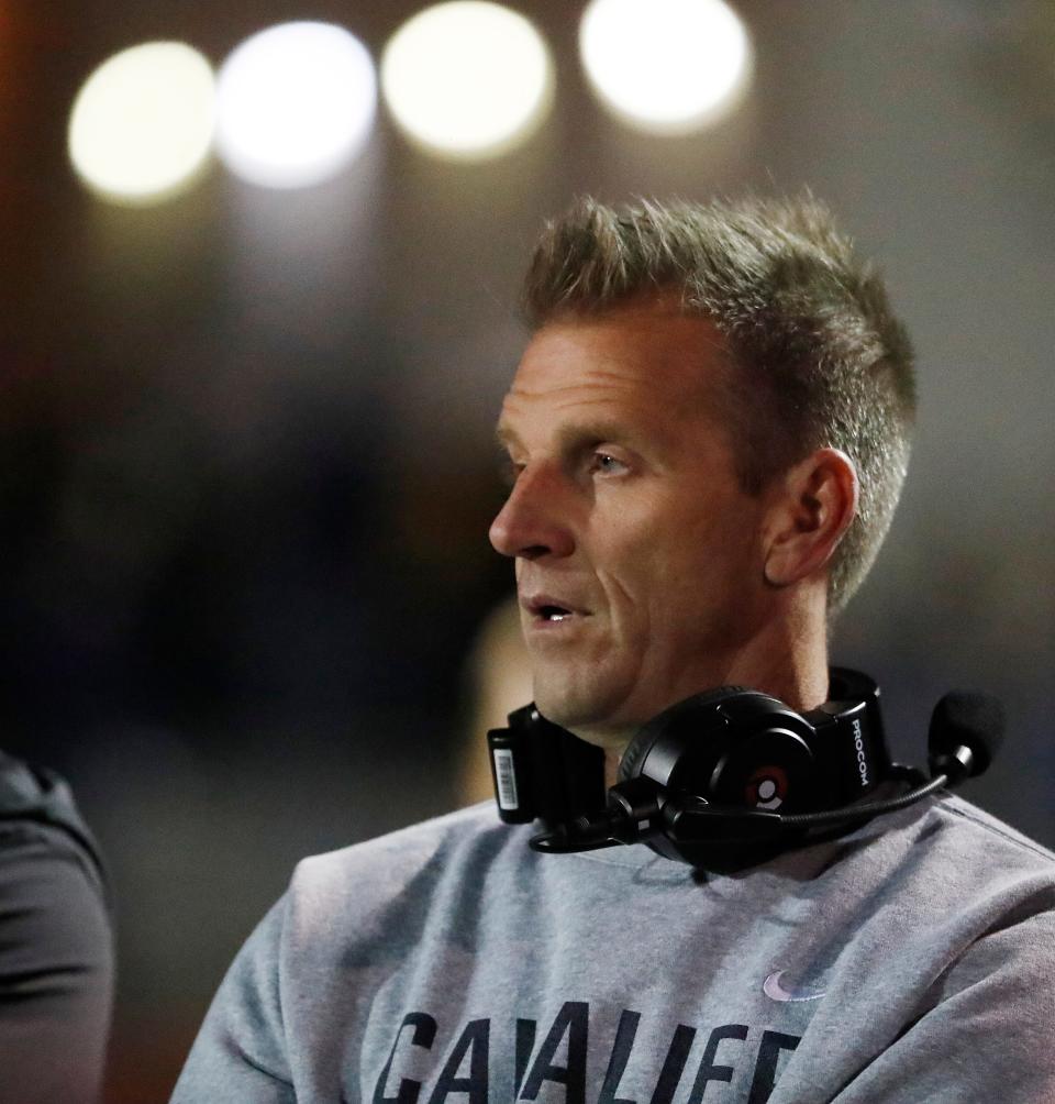 Central Valley Christian's Head Coach Mason Hughes on the sidelines against Lemoore during their Central Section Division II high school football championship playoff game in Visalia, Calif., Friday, Nov. 24, 2023.