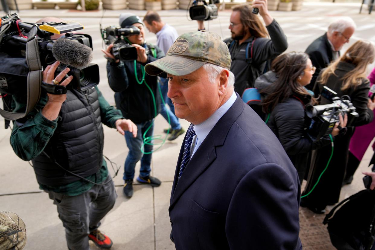 Former Ohio House Speaker Larry Householder is surrounded by reporters outside the Potter Stewart U.S. Courthouse in downtown Cincinnati on Thursday, March 9, 2023 after a jury found him and ex-Ohio Republican Party chairman Matt Borges guilty of racketeering conspiracy.