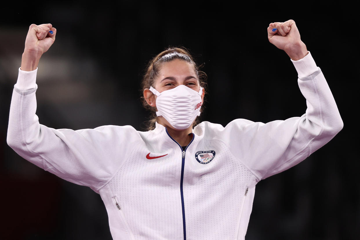 Gold medallist Anastasija Zolotic of the United States poses at a victory ceremony for the women's (Valery Sharifulin / TASS / Getty Images)