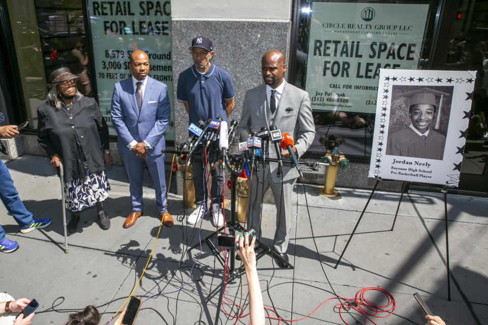 From right, attorney Donte Mills; Jordan Neely's father, Andre Zachery; attorney Lennon Edwards; and Neely's aunt Mildred Mahazu appears at a news conference in New York City on Friday, May 12, 2023. Daniel Penny, 24, a U.S. Marine Corps veteran, appeared in court hours after turning himself in at a police station after prosecutors said they were charging him in connection with the May 1 death of Jordan Neely. (AP Photo/Ted Shaffrey)