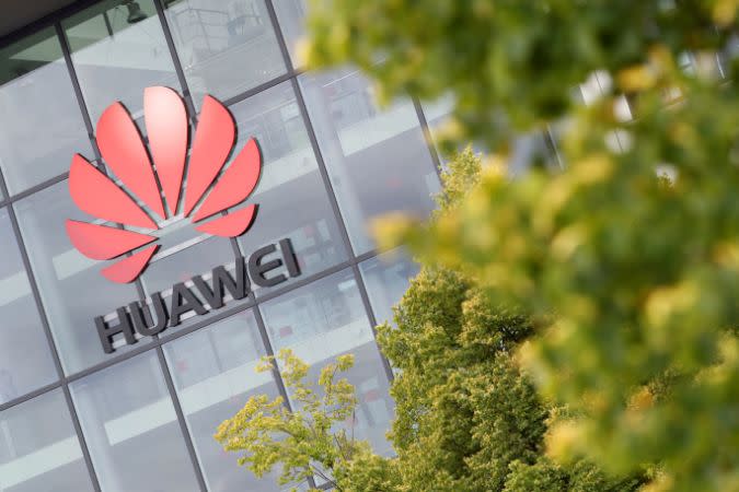 Huawei logo is pictured on the headquarters building in Reading, Britain July 14, 2020. REUTERS/Matthew Childs - RC2YSH93WJFF