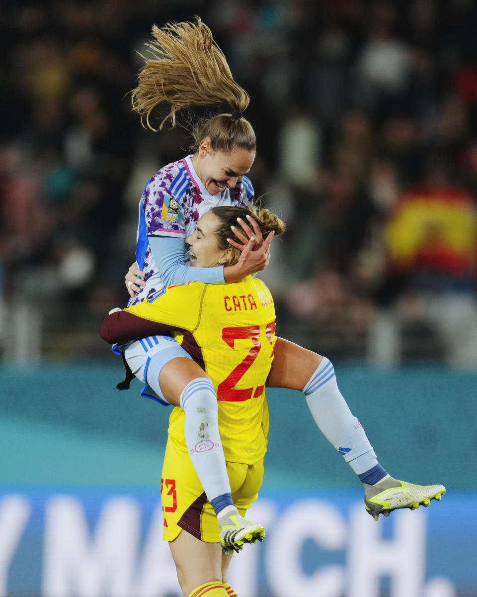 Spain's Irene Guerrero embraces teammate and goalkeeper Cata Coll following the Women's World Cup second round soccer match between Switzerland and Spain at Eden Park in Auckland, New Zealand, Saturday, Aug. 5, 2023. (AP Photo/Abbie Parr)