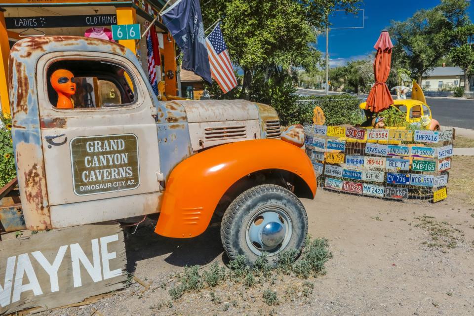 File: Orange Alien on Main Street in pickup truck, Seligman on historic Route 66, Arizona.