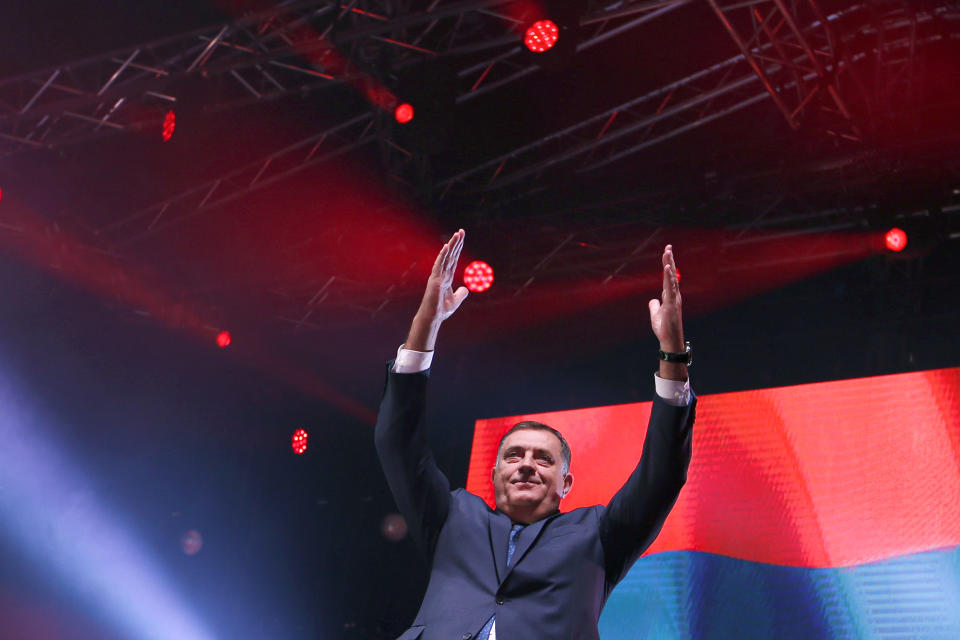 FILE- President of the Republic of Srpska Milorad Dodik waves during the final campaign rally in the Bosnian town of Banja Luka, Bosnia, on Oct. 5, 2018. Long-reigning Bosnian Serb leader, Milorad Dodik, has grown increasingly hostile this week as the West turned up the pressure on him to stop a spiraling secessionist campaign in his multiethnic Balkan country of 3.3 million people that has never truly recovered from its fratricidal 1992-95 war. (AP Photo/Darko Vojinovic, File)