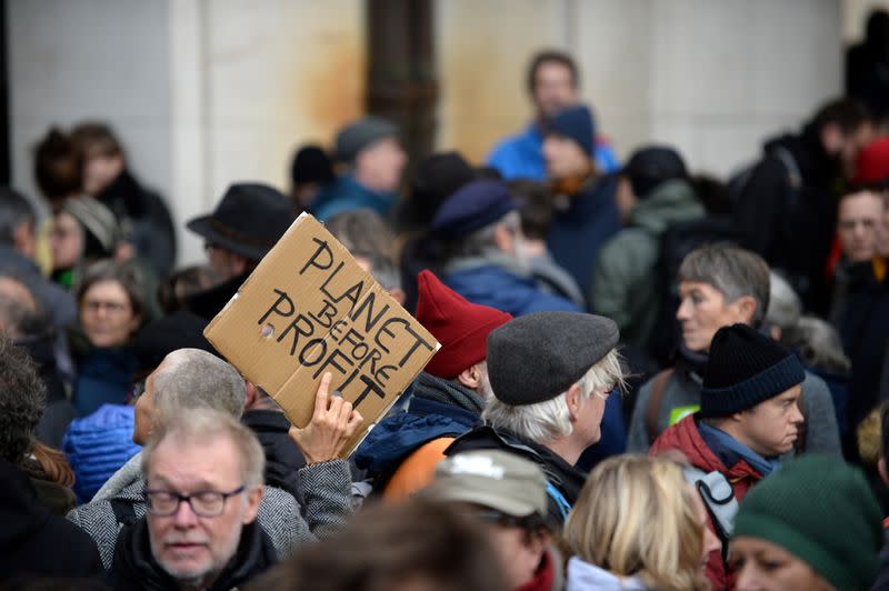 People attend a climate change protest in Brussels