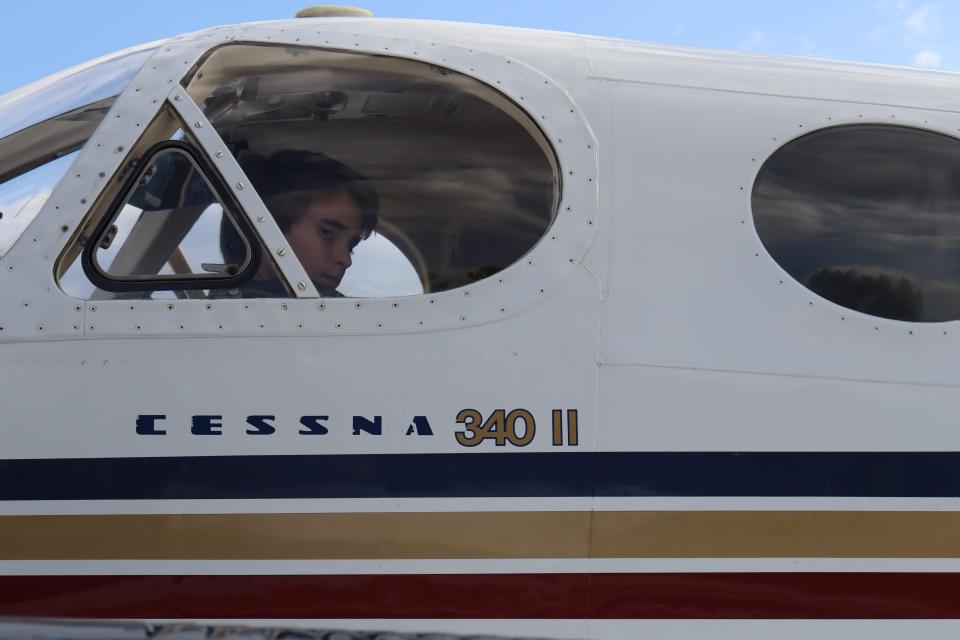 Mason Lambertsen, 12, checks out the inside of a Cessna Thursday during Louisiana State University of Alexandria's Professional Aviation Program open house at England Airpark.