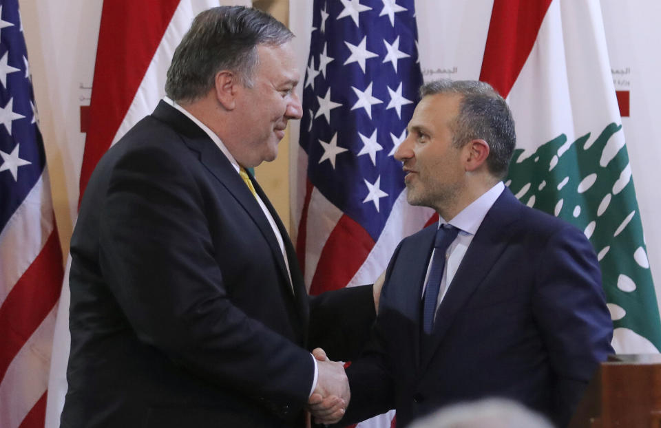 U.S. Secretary of State Mike Pompeo shakes hands with Lebanese Foreign Minister Gebran Bassil after a public statement in Beirut, Lebanon, Friday, March 22, 2019. (Jim Young/Pool Image via AP)