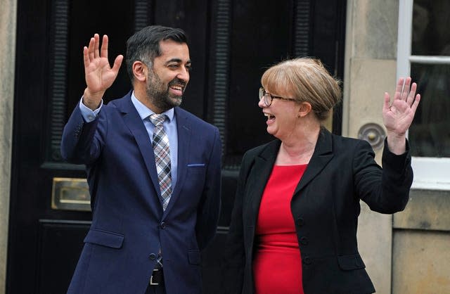 Newly elected First Minister of Scotland Humza Yousaf and Deputy First Minister Shona Robison on the steps of Bute House, Edinburgh, after their first Cabinet meeting