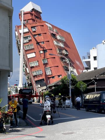 <p>Hualien County Fire Department/Anadolu via Getty Images</p> Building in Taiwan tilts dangerously after April 3 earthquake