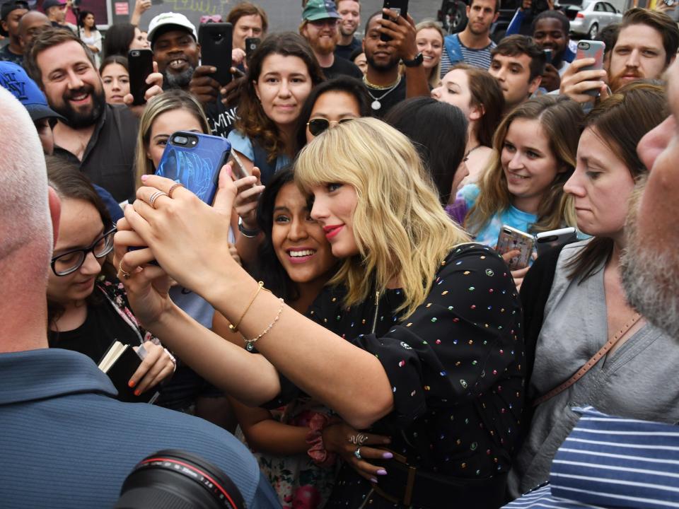 Taylor Swift with fans in 2019.