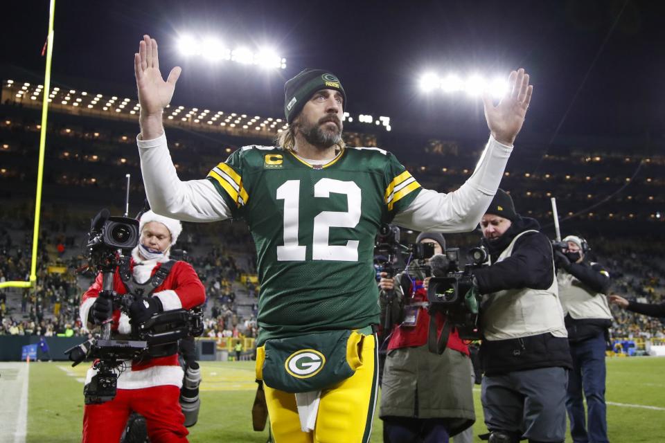 Green Bay Packers' Aaron Rodgers celebrates after an NFL football game against the Cleveland Browns Saturday, Dec. 25, 2021, in Green Bay, Wis. The Packers won 24-22. (AP Photo/Matt Ludtke)