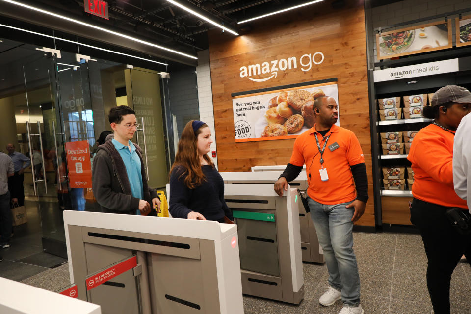 NEW YORK, NEW YORK - MAY 07: People shop at the newly opened Amazon Go Store on May 07, 2019 in New York City. The cashier-less store, the first of this type of store, called Amazon Go, accepts cash and is the 12th such store in the United States located at Brookfield Place in downtown New York. The roughly 1,300-square-foot store sells a variety of food items, prepared meals and Amazon's own meal kits. It is believed that by 2021 Amazon is considering opening up as many as 3,000 of its cashier-free stores across the United States. (Photo by Spencer Platt/Getty Images)