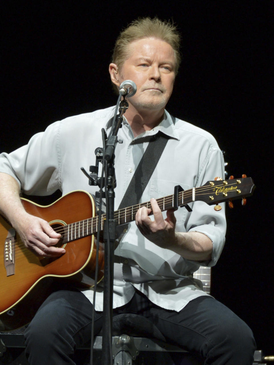 FILE - Don Henley of The Eagles performs on the "History of the Eagles" tour at the Forum, on Wednesday, Jan. 15, 2014, in Los Angeles. Henley, the co-founder of classic rock band the Eagles, is scheduled to testify Monday, Feb. 26, 2024, at the criminal trial of three collectibles professionals. They're charged with colluding to veil the questioned ownership of sheets of draft lyrics to “Hotel California” and other Eagles hits in order to sell them and deflect Henley’s demands for their return. (Photo by John Shearer/Invision/AP, File)