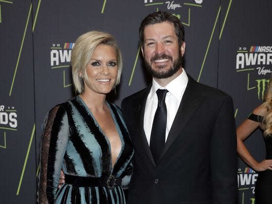 Martin Truex Jr. (right) and Sherry Pollex attend the NASCAR Cup Series awards in 2017.