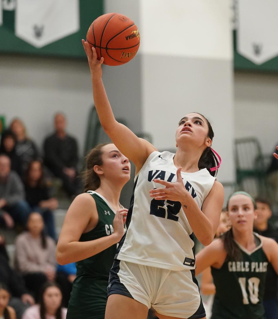 Putnam Valley's Brianna Foody (22) drives to the basket during the NYSPHSAA girls basketball Class B regional final against Carle Place at Yorktown High School in Yorktown Heights on Saturday, March 9, 2024.