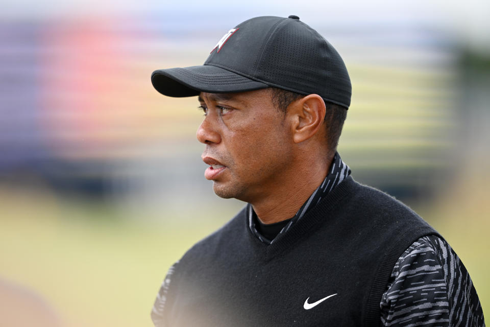 ST ANDREWS, SCOTLAND - JULY 13: Tiger Woods of the United States looks on from the range during a practice round prior to The 150th Open at St Andrews Old Course on July 13, 2022 in St Andrews, Scotland. (Photo by Stuart Franklin/R&A/R&A via Getty Images)