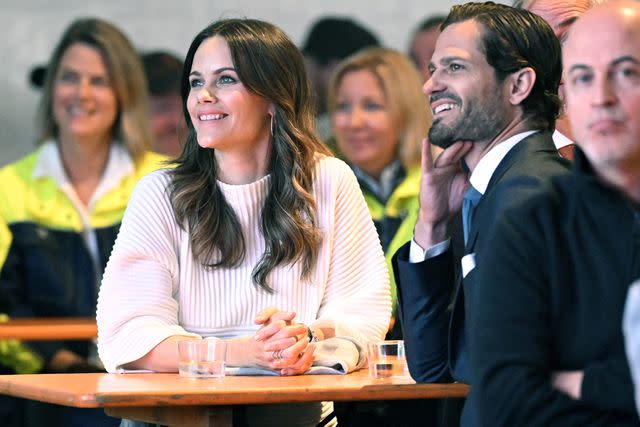 <p>Fredrik Sandberg/TT/Shutterstock </p> Princess Sofia and Prince Carl Philip at Volvo CE in Arvika, Varmland, Sweden on Sept. 4, 2024.