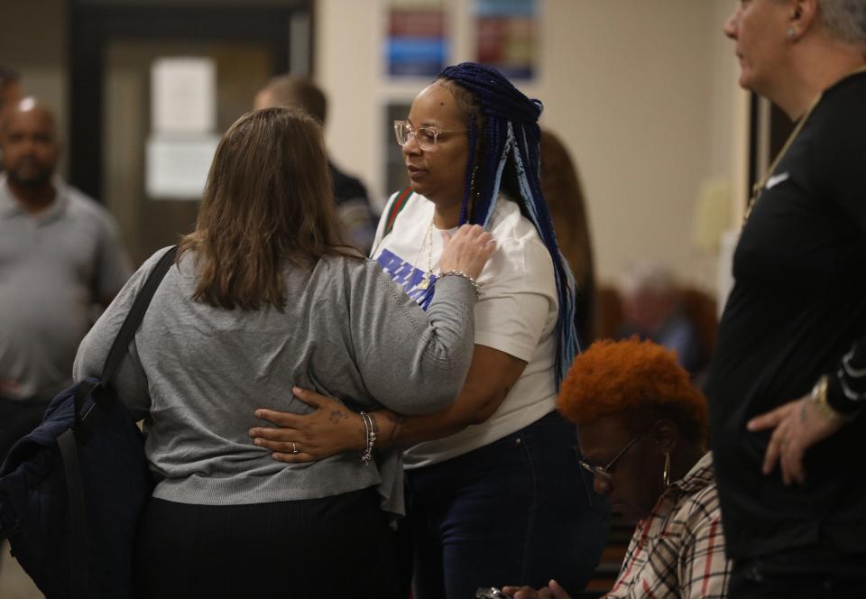 Lynn Mazurkiewicz hugs and chats briefly with Lushone Siplin after she arrived. The two women were there for the trial of Kelvin Vickers Jr. who is accused of fatally shooting Mazurkiewicz's husband, Rochester Police Officer Anthony Mazurkiewicz, and Siplin's son, Richard Collinge, as well as another man, MyJel Rand in a two day span.