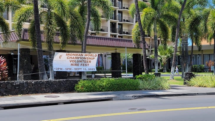 <span class="article__caption">A sign outside of the King Kamehameha Hotel advertises a recruitment event for Ironman World Championship volunteers.</span> (Photo: Susan Lacke)