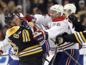 BOSTON, MA - OCTOBER 27: Brad Marchand #63 of the Boston Bruins and Josh Gorges #26 of the Montreal Canadiens shove each other in the second period on October 27, 2011 at TD Garden in Boston, Massachusetts. (Photo by Elsa/Getty Images)