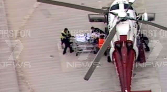 Emergency crews transport the teen to Royal Melbourne Hospital. Picture: 7 news