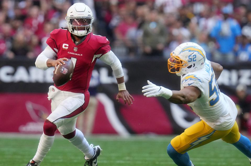 Nov 27, 2022; Glendale, AZ, USA;  Arizona Cardinals quarterback Kyler Murray (1) scrambles past Los Angeles Chargers linebacker Khalil Mack (52) during the first half at State Farm Stadium. Mandatory Credit: Joe Rondone-USA TODAY Sports