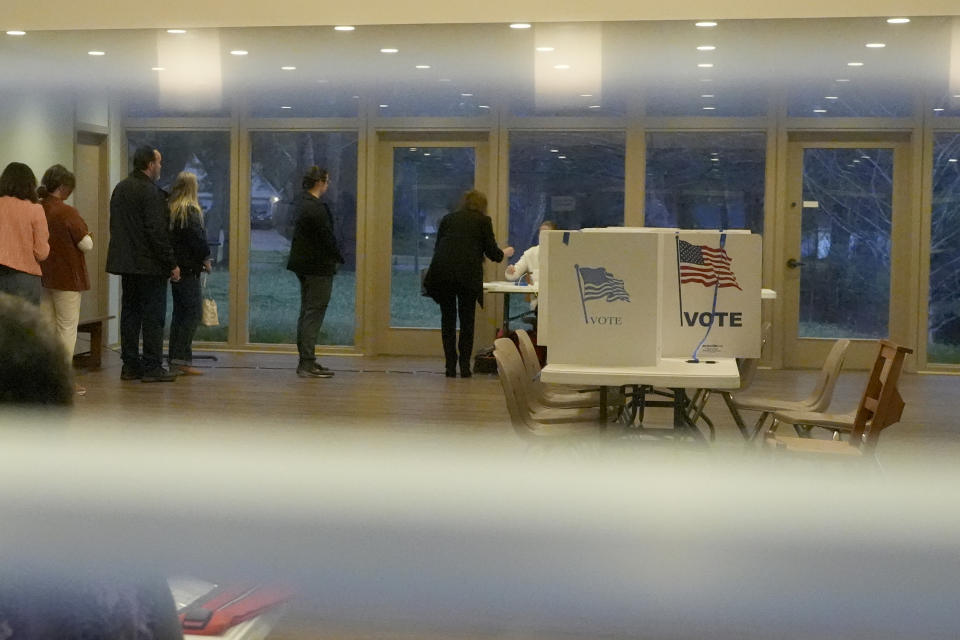 Voters line up to cast their ballots shortly after this north Jackson, Miss., election precincts is opened for the Mississippi's party primaries, Tuesday, March 12, 2024. (AP Photo/Rogelio V. Solis)